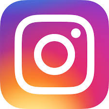 The Instagram logo featuring a gradient background that transitions from purple to orange. The design includes a simple white camera icon in the center, which consists of a circle surrounded by a square with rounded corners. The logo represents the popular social media platform known for sharing photos and videos.