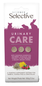 Packaging of Science Selective Urinary Care supplement, featuring three pieces of the supplement. The packaging highlights ingredients such as dandelion, cranberry, echinacea, and vitamin C, promoting a healthy urinary system for rabbits, guinea pigs, and chinchillas. The background is purple, with a silhouette of rabbits and flowers.